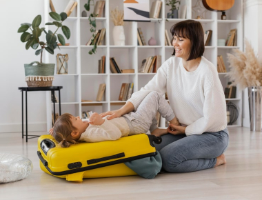 Professional hotel babysitting service in Dubai caring for a child in a hotel room.