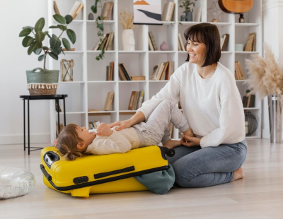 Professional hotel babysitting service in Dubai caring for a child in a hotel room.