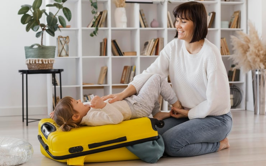 Professional hotel babysitting service in Dubai caring for a child in a hotel room.