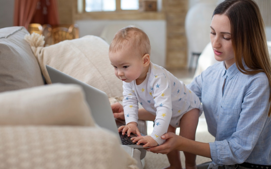 Baby caregiver caring for infant at home in Dubai with nurturing support