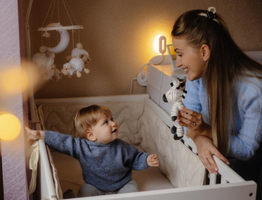 Professional night babysitter caring for child safely overnight in Dubai