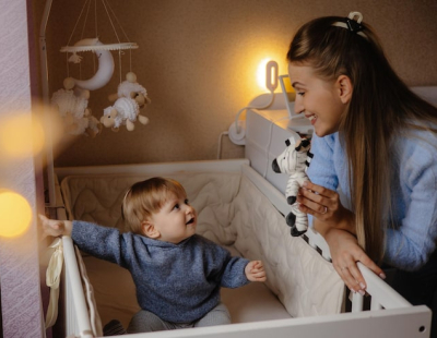 Professional night babysitter caring for child safely overnight in Dubai