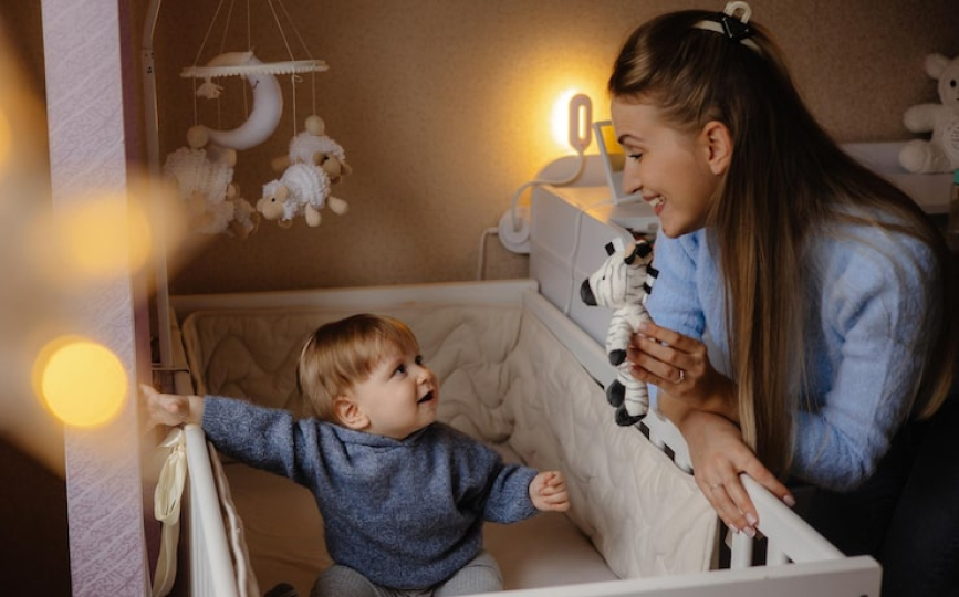 Professional night babysitter caring for child safely overnight in Dubai