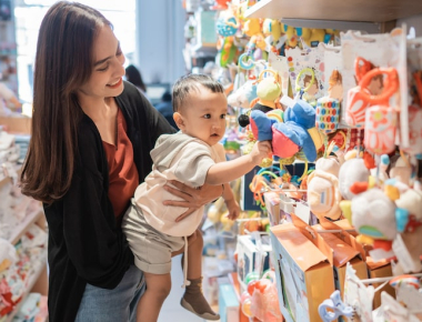 Mall babysitting care area with children playing safely under professional supervision