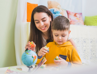 Professional caregiver providing emergency child care service Dubai for children at home