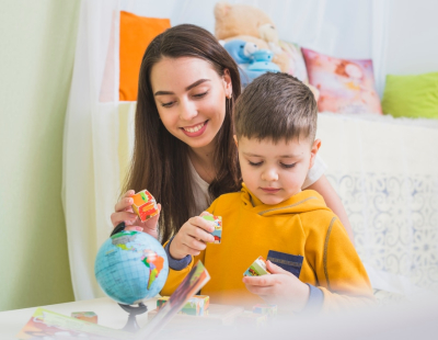 Professional caregiver providing emergency child care service Dubai for children at home