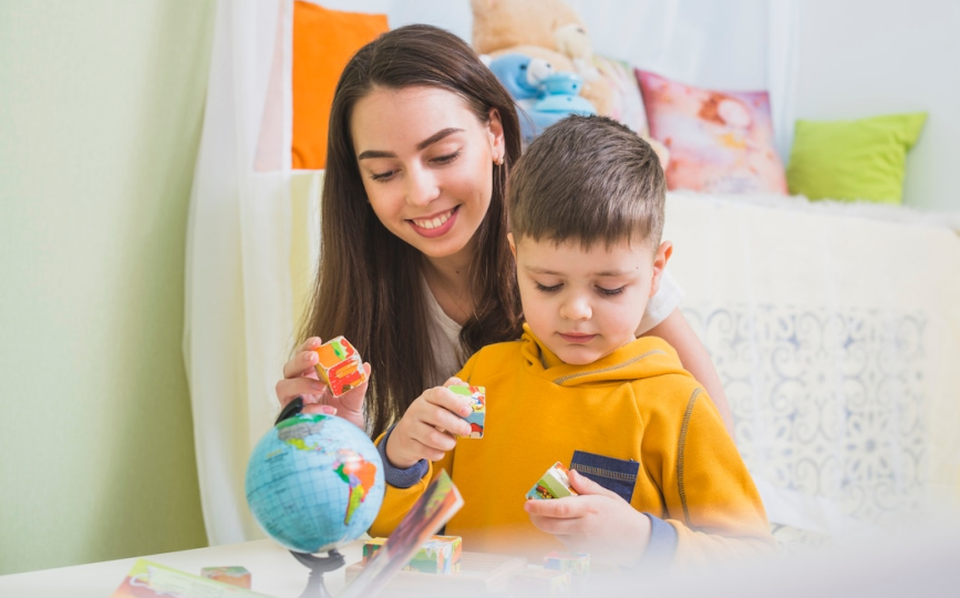 Professional caregiver providing emergency child care service Dubai for children at home